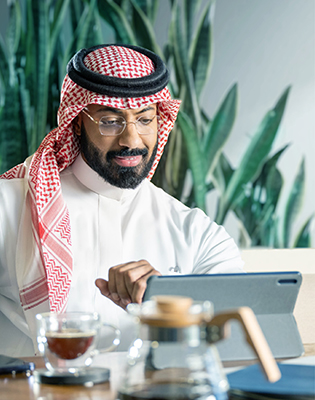 Executive boardroom overlooking the Arabian Gulf representing institutional client partnerships